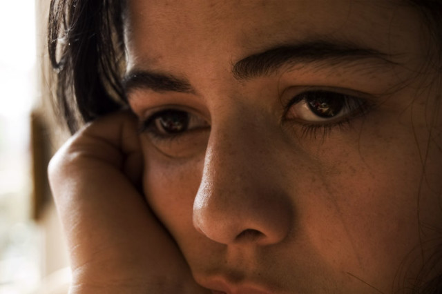 Occhi tristi di donna