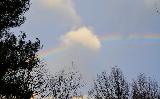 Immagine arcobaleno Arcobaleno interrotto da piccola nuvola