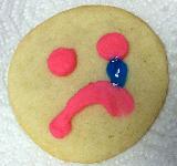 Immagine triste Biscotto con disegnata faccia triste che piange