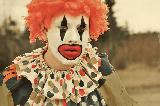 Immagine clown Clown con capelli arancioni molto triste