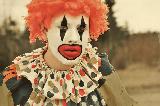 Immagine triste Clown con capelli arancioni molto triste