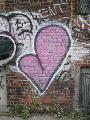 Immagine fatto Disegno di cuore rosa su muro fatto di mattoncini