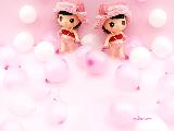 Immagine dolci Dolci bamboline tra bellissimi palloncini