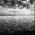 Immagine cielo Mare e cielo grigi che suscitano tristezza