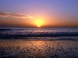 Immagine limpido Spiaggia e mare con cielo quasi limpido al tramonto